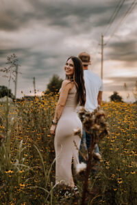 couple portrait in outdoor location in a field in cecilia la