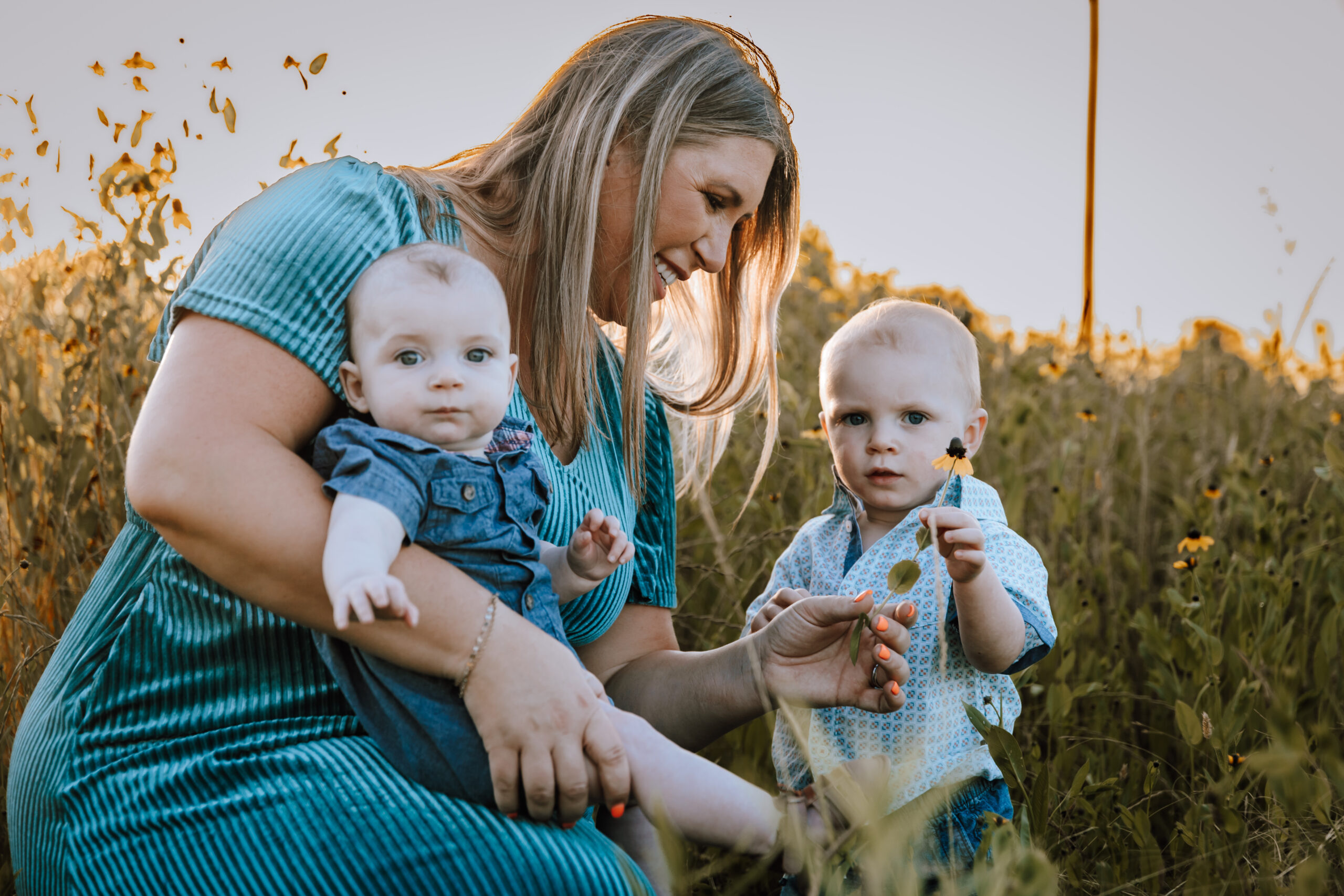 mom with 2 kids in field for a portrait session